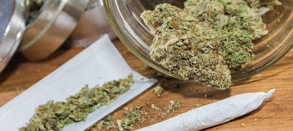 Cannabis spilling out of a jar